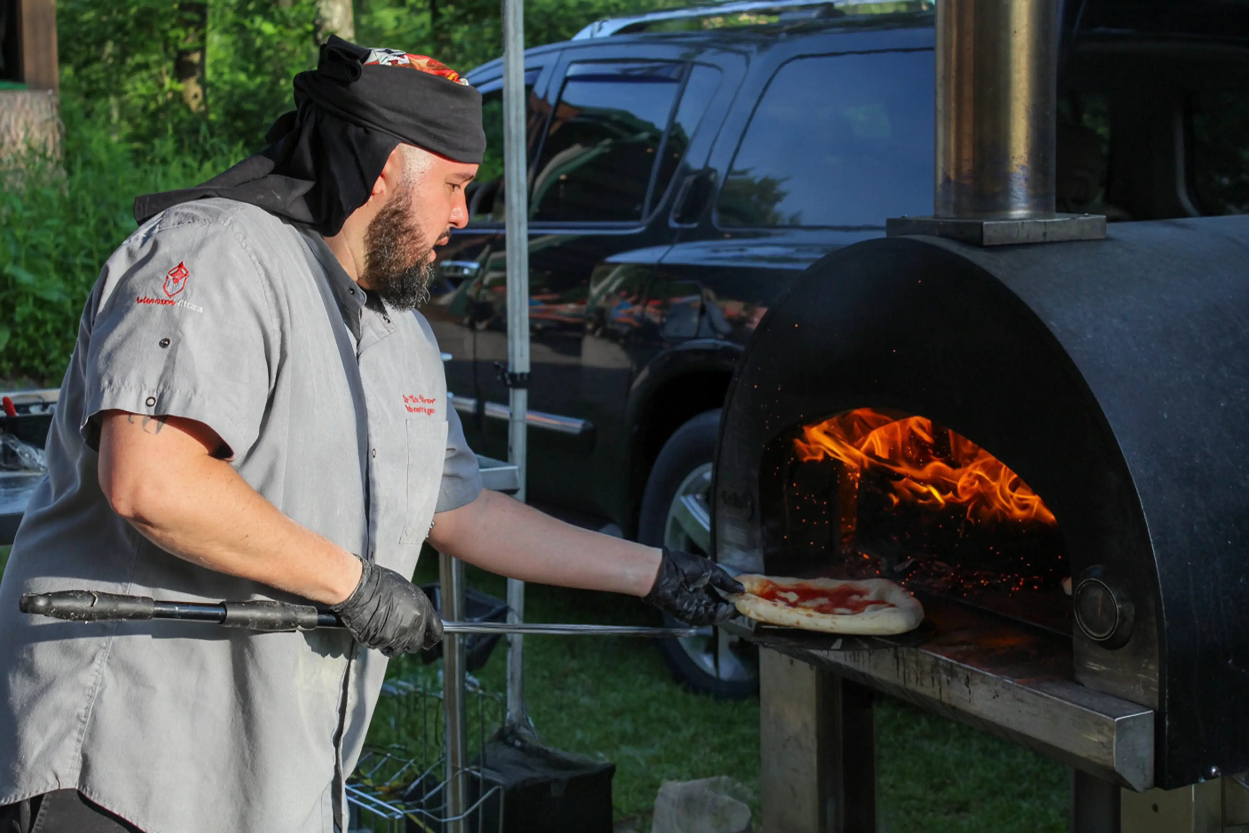 Jon-Baking-Wood-Fired-Pizza