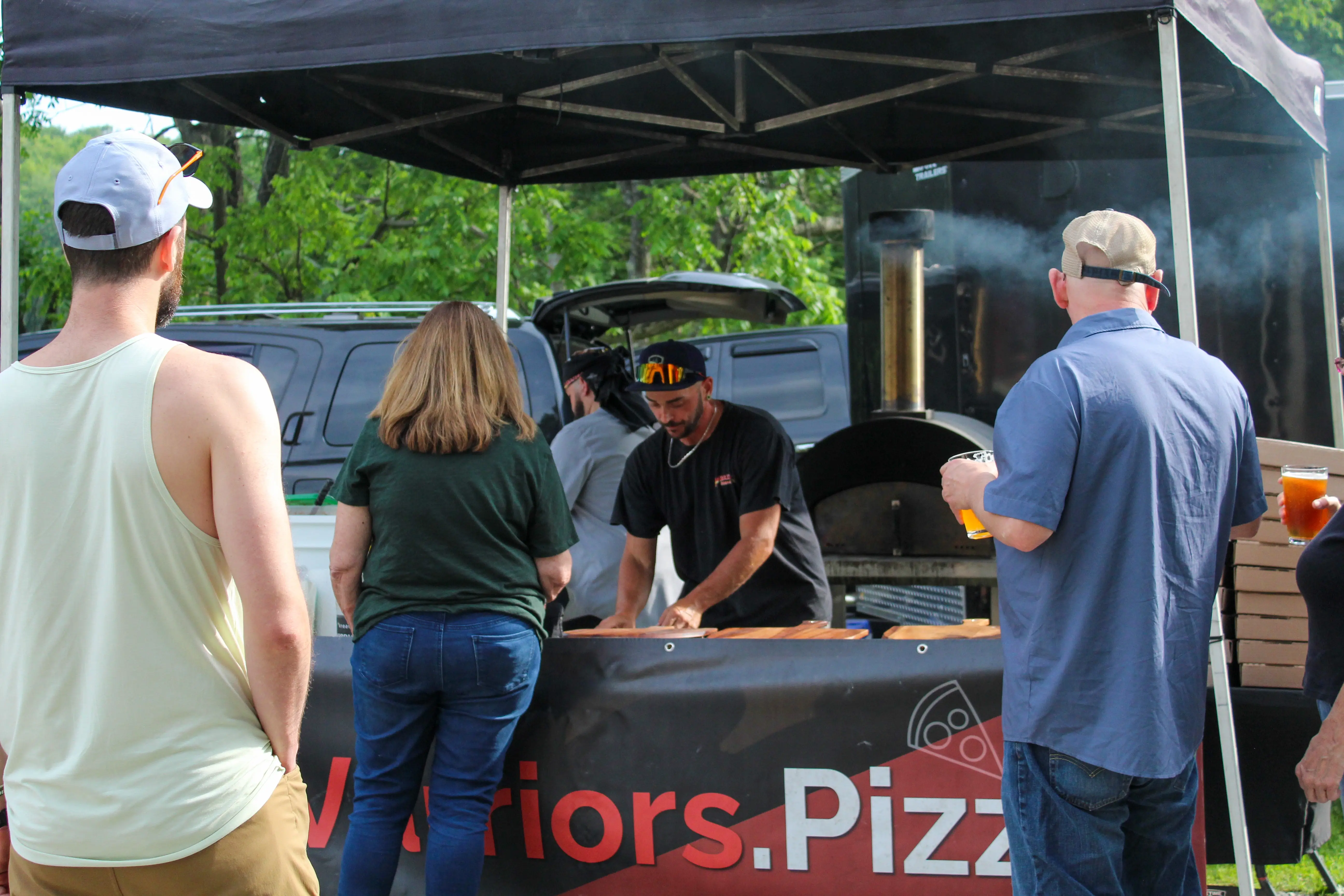 Warriors-Pizza-Serving-Customers